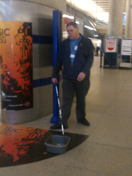 22nd January 2014: The blind whistling busker at Canary Wharf tube station. Boy can he whistle loudly!