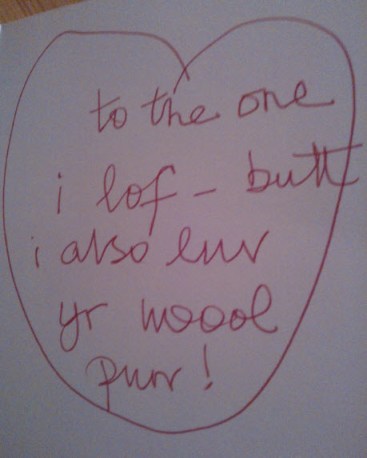 Translation:  To the one I love - but I also love your wool.  purr!