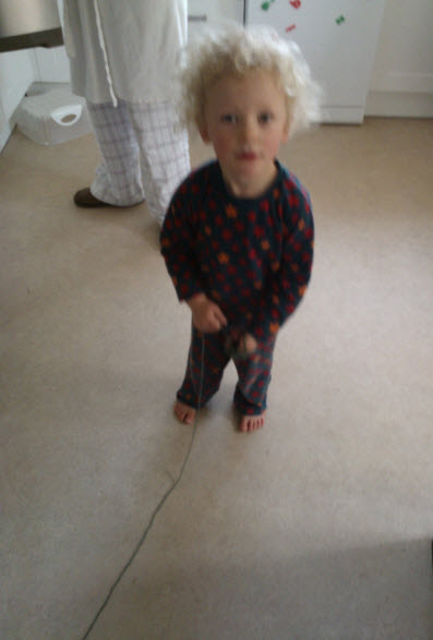 1st March 2014:  A bit blurry, but this is Gorgeous Godson, the morning of his birthday, rather happy with his wool!