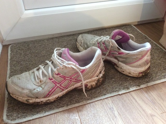 Used, muddy and happy trainers